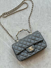 CHANEL FLAP BAG WITH TOP HANDLE