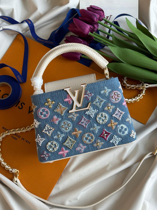 NEW LV CAPUCINES