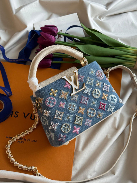 NEW LV CAPUCINES
